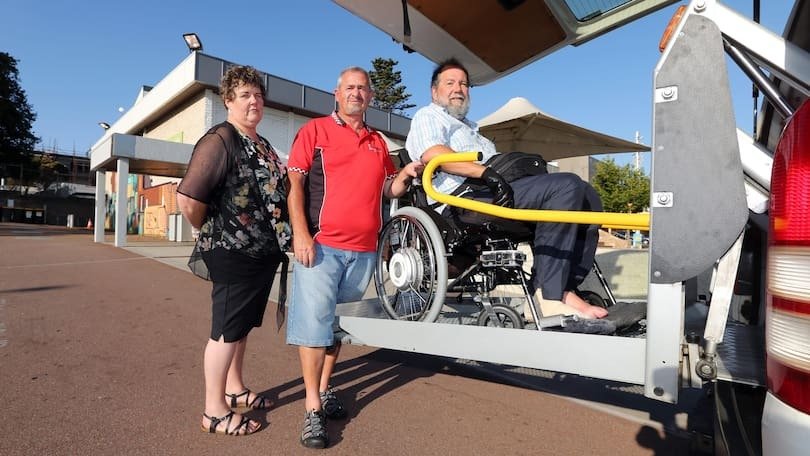 Albany wheelchair accessible taxi drivers Ellie and David Barras with passenger Colin May. Credit: Laurie Benson Albany Advertiser